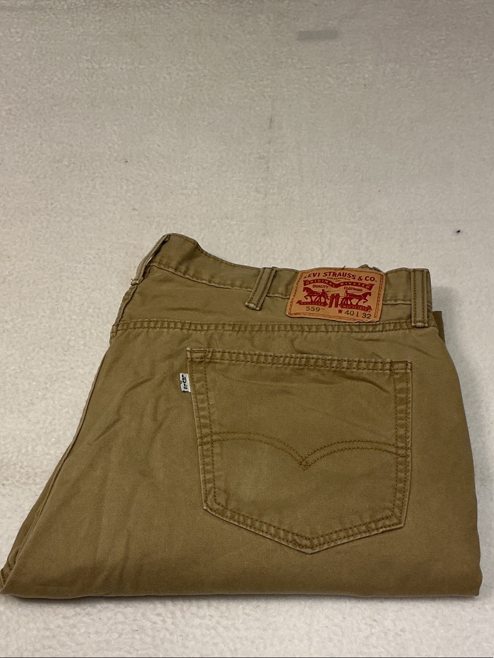 Levi's 559 , 40x32 Men’s Brown Khaki Jeans - Folded Back Pocket View. 3159